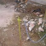 Earth wire connected to earth rod outside property